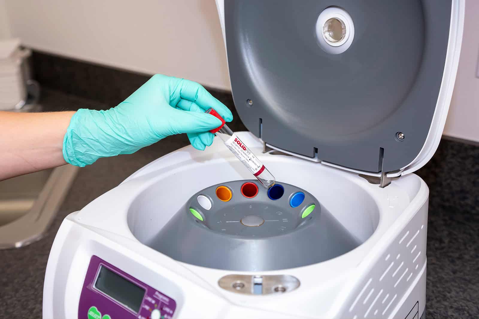 Inserting a biologics tube for processing