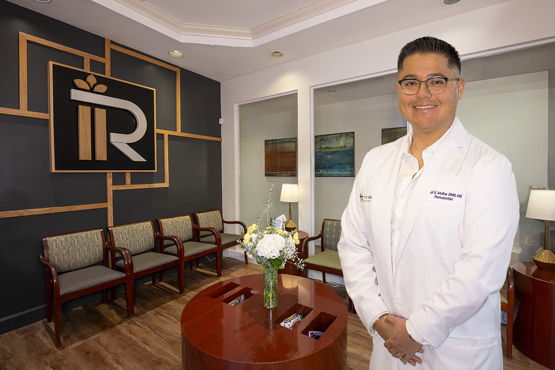Dr. Molina at his dental office